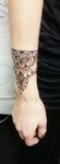 Kaja_memento_tattoo_mandala_dotwork_arm_hand.jpg